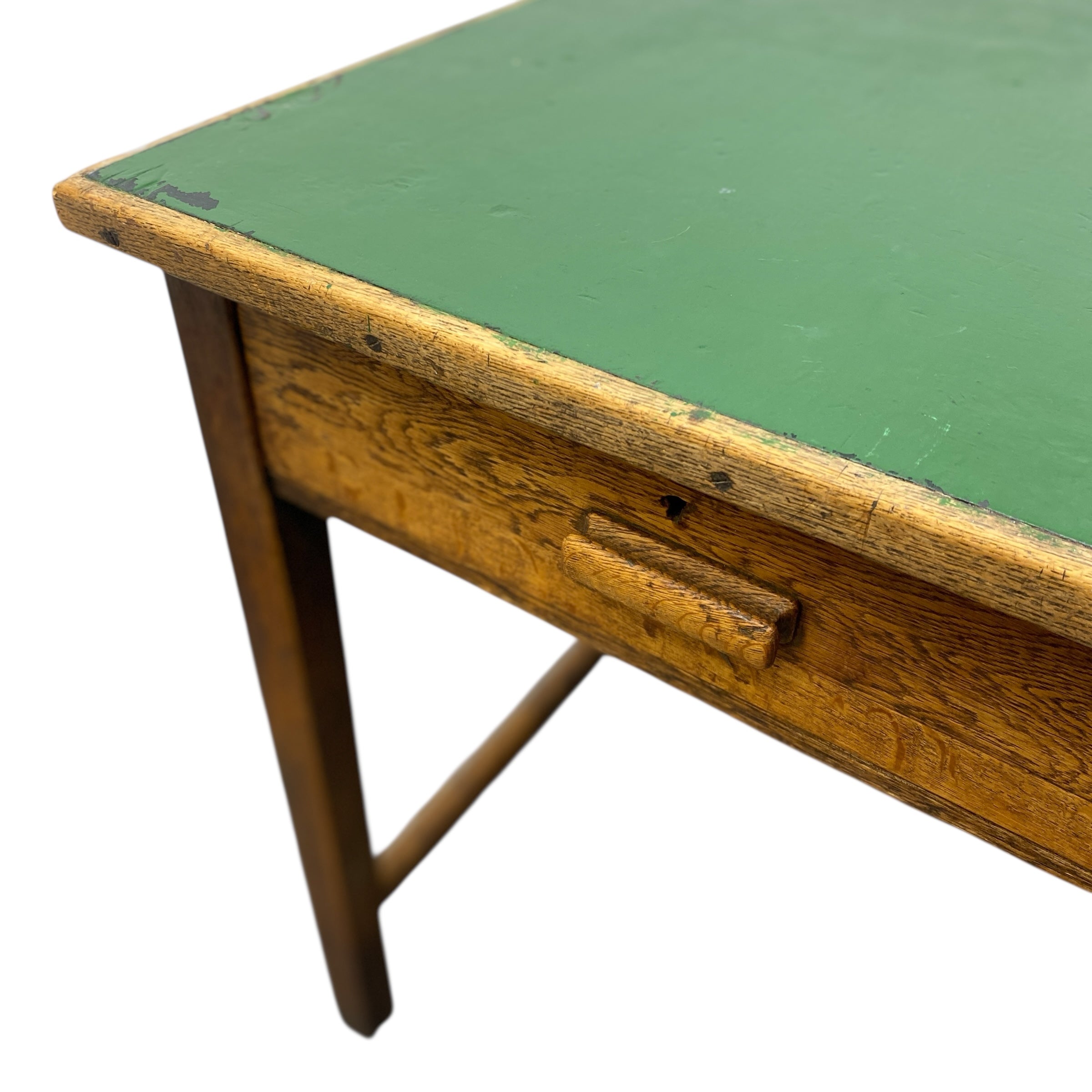 Vintage wooden desk with green top on a white background