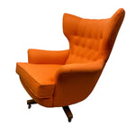Load image into Gallery viewer, Orange wingback chair on a white background
