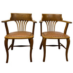 Load image into Gallery viewer, Two wooden chairs with leather seats on a white background
