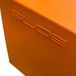 Load image into Gallery viewer, Close-up of an orange object with &#39;SLIDE&#39; embossed on it.
