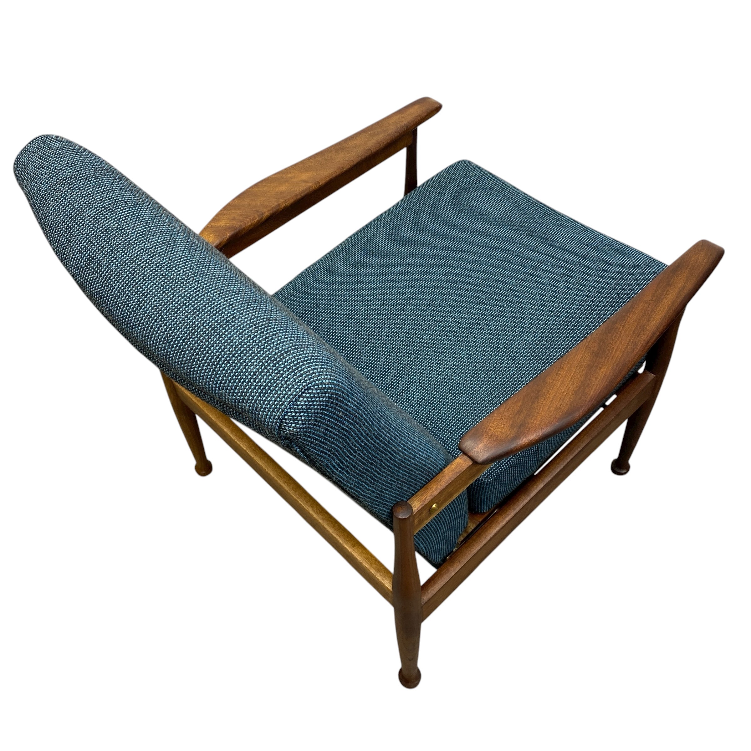 Wooden chair with blue cushion on a white background