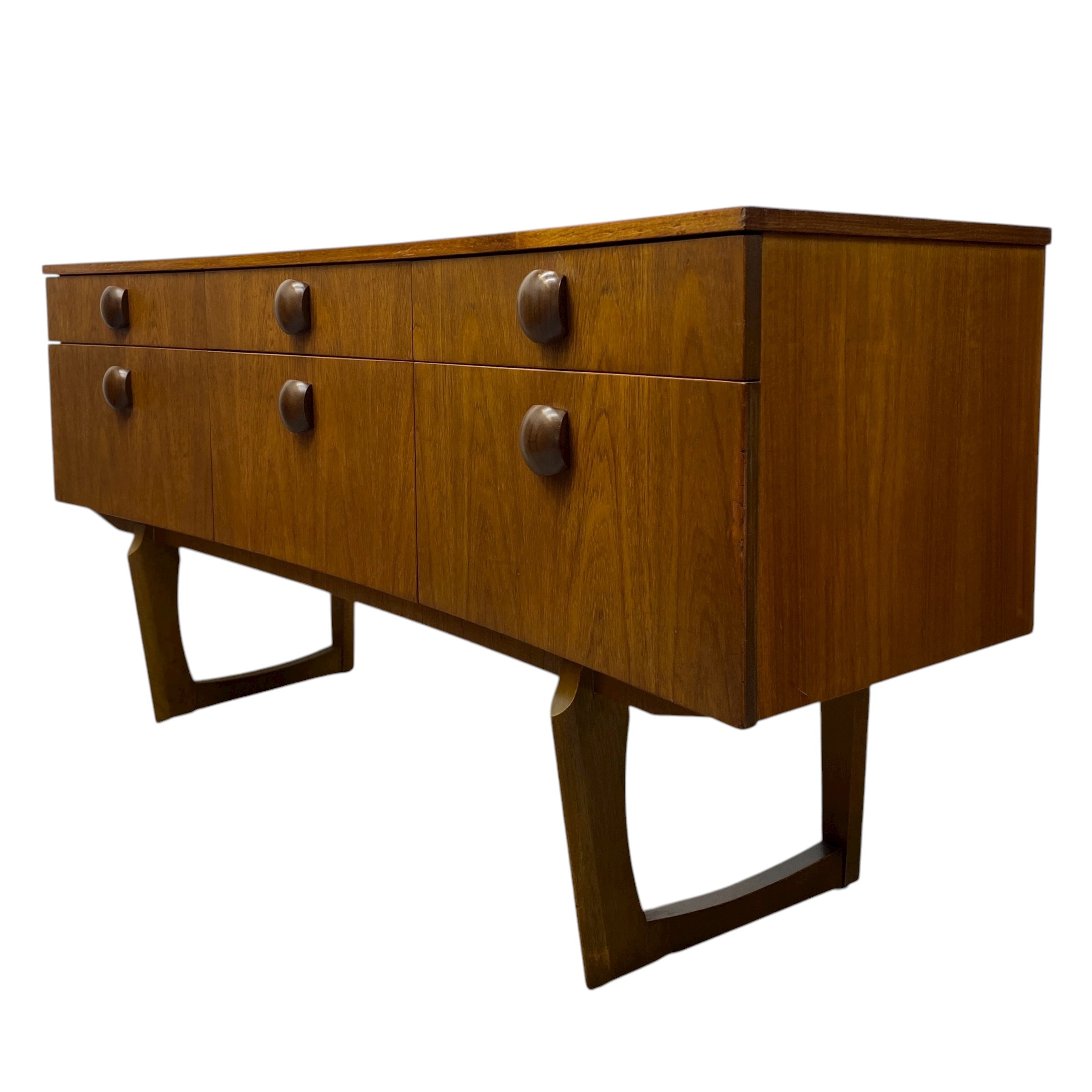 Wooden sideboard with six drawers on a white background