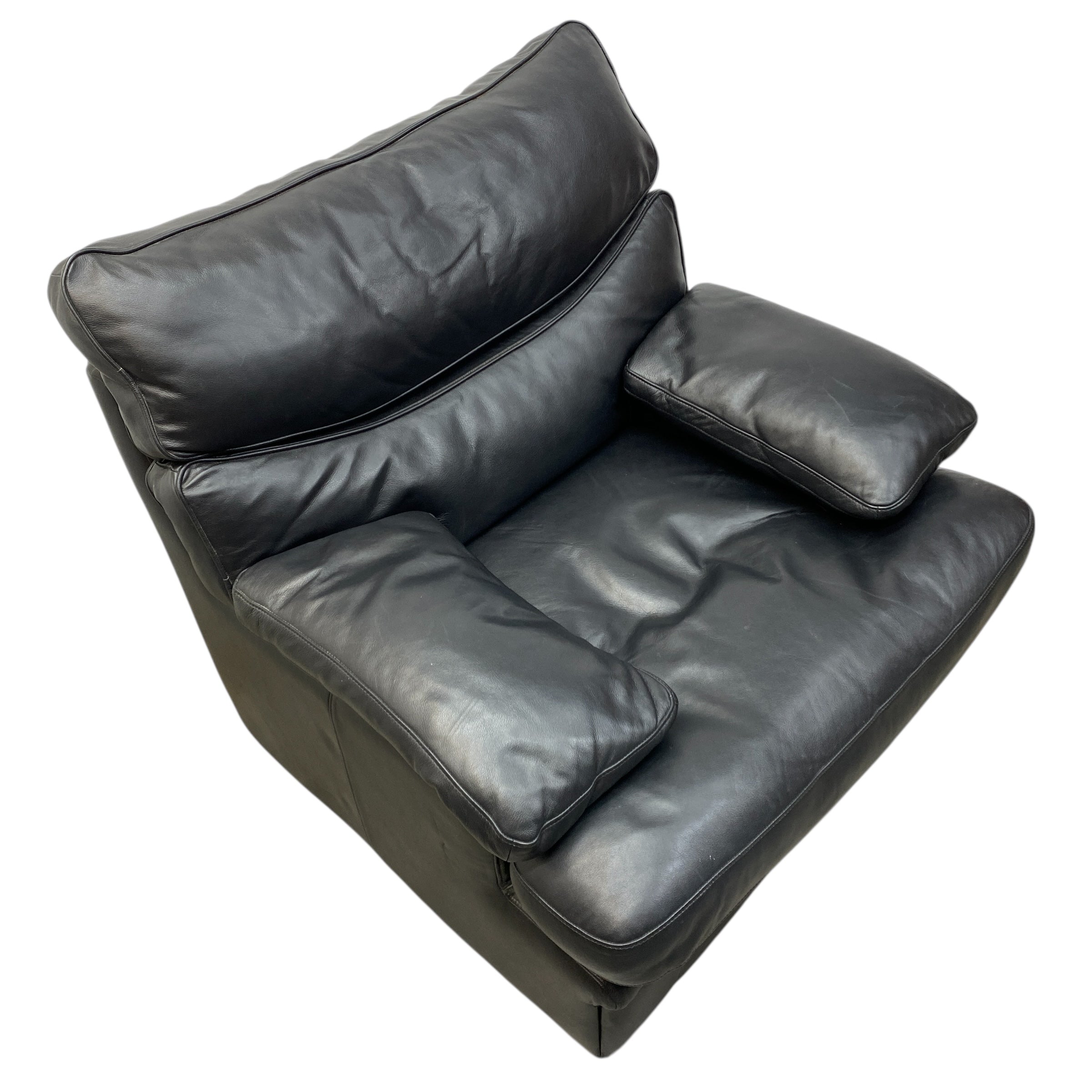 Black leather armchair on a white background