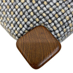Load image into Gallery viewer, Close-up of a textured fabric surface with a wooden button on a white background
