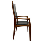 Load image into Gallery viewer, Wooden chair with black seat on a white background
