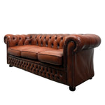 Load image into Gallery viewer, Reddish Brown leather sofa with tufted backrest on a white background
