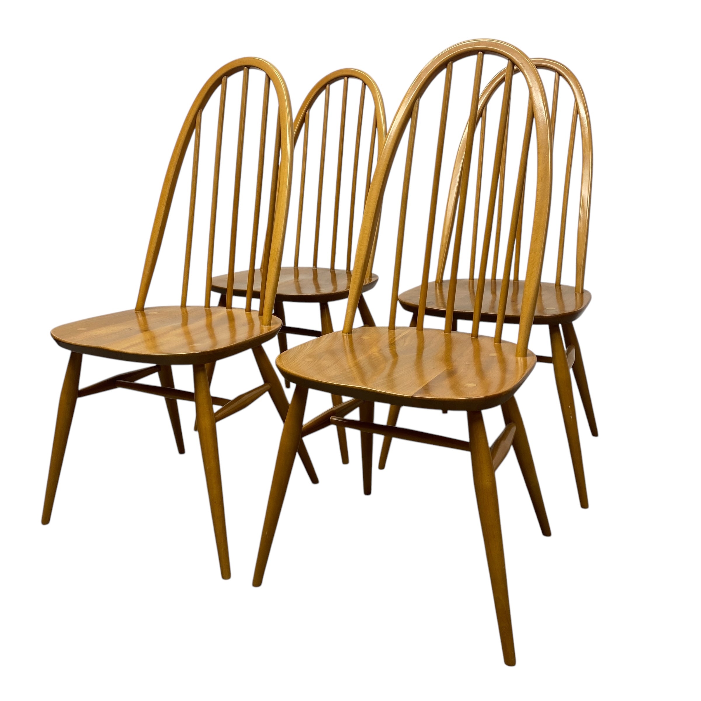 set of four ercol dining chairs