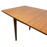 Load image into Gallery viewer, Wooden dining table with a white background
