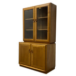 Load image into Gallery viewer, Wooden cabinet with glass doors and solid doors on a white background
