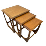 Load image into Gallery viewer, Set of three wooden nesting tables on a white background
