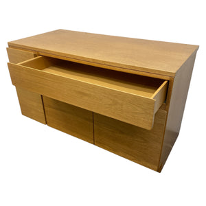 Wooden sideboard with a drawer on a white background