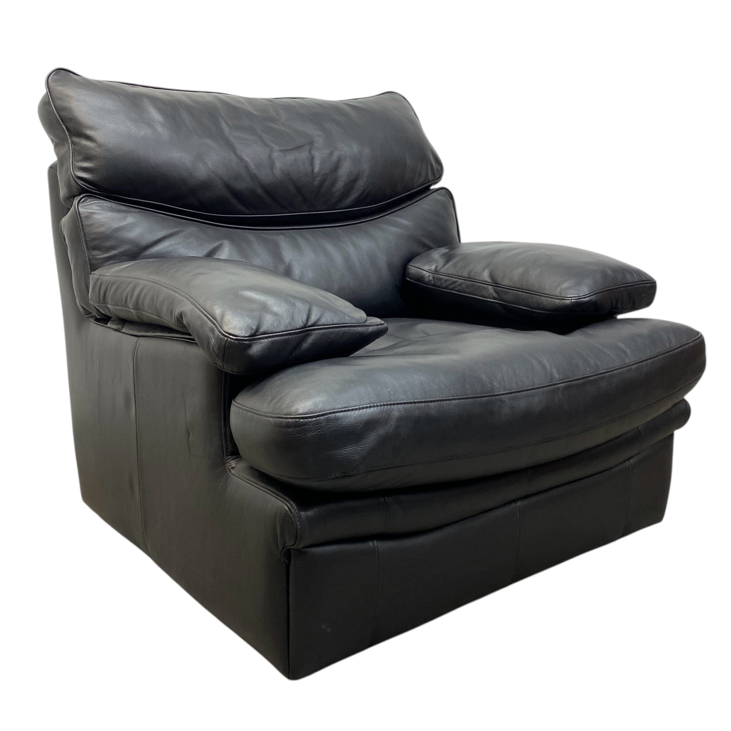 Black leather recliner chair on a white background