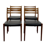 Load image into Gallery viewer, TEAK &amp; VINYL DINING CHAIRS ON A WHITE BACKGROUND
