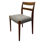 Load image into Gallery viewer, Wooden chair with a gray upholstered seat on a white background
