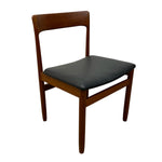 Load image into Gallery viewer, Wooden chair with black leather seat on a white background
