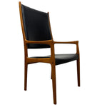 Load image into Gallery viewer, Chair with wooden frame and black leather seat on a white background
