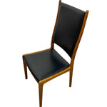 Load image into Gallery viewer, Chair with black leather seat and backrest on a white background
