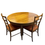 Load image into Gallery viewer, Wooden dining table with four chairs on a white background
