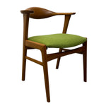 Load image into Gallery viewer, Wooden chair with a green cushion on a white background
