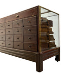Load image into Gallery viewer, Wooden dresser with glass front on a white background
