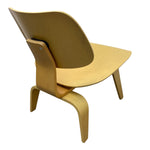 Load image into Gallery viewer, Wooden chair with a modern design on a white background
