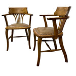 Load image into Gallery viewer, Two wooden chairs with leather seats on a white background

