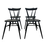 Load image into Gallery viewer, Four black wooden chairs on a white background
