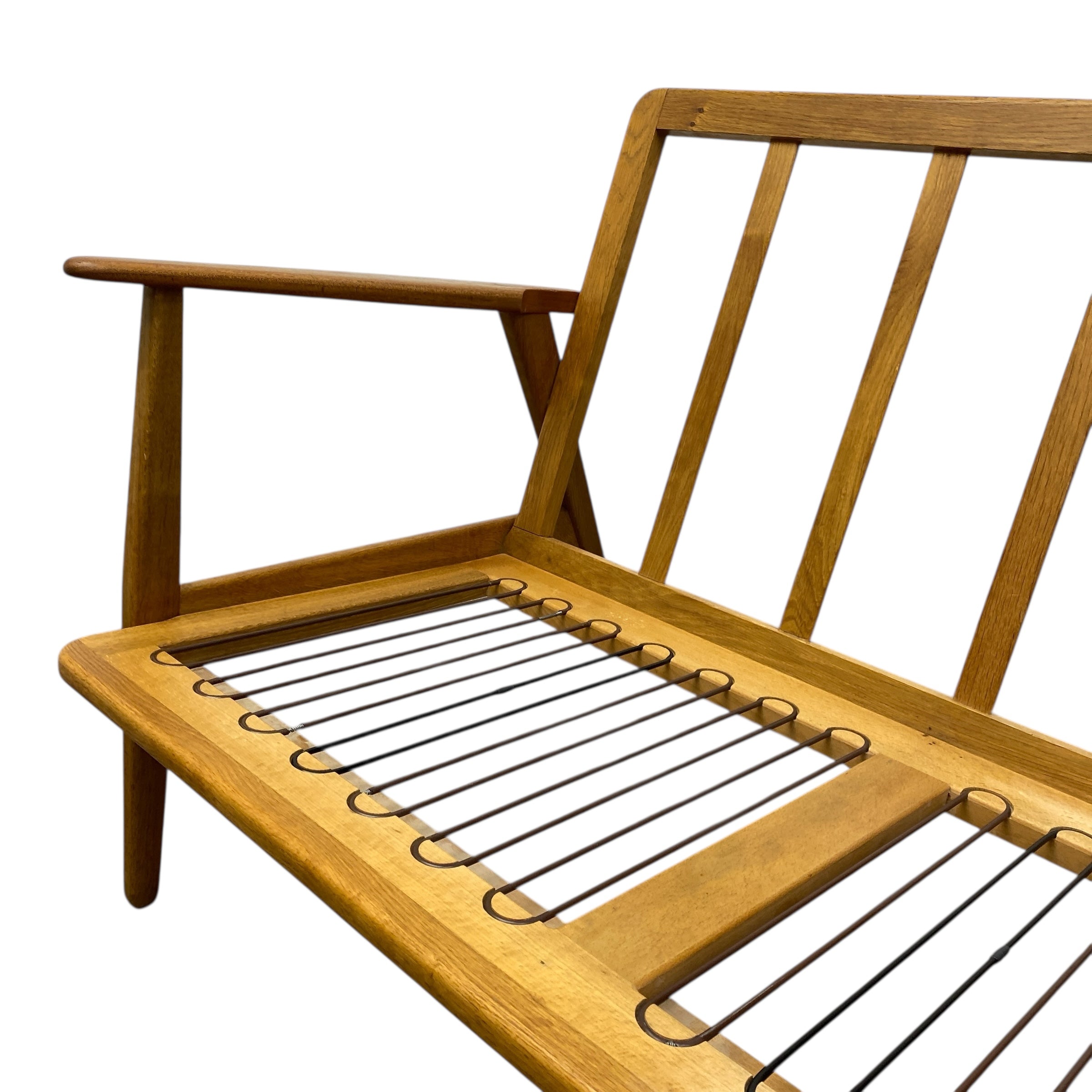 Sofa with wire webbing on a white background