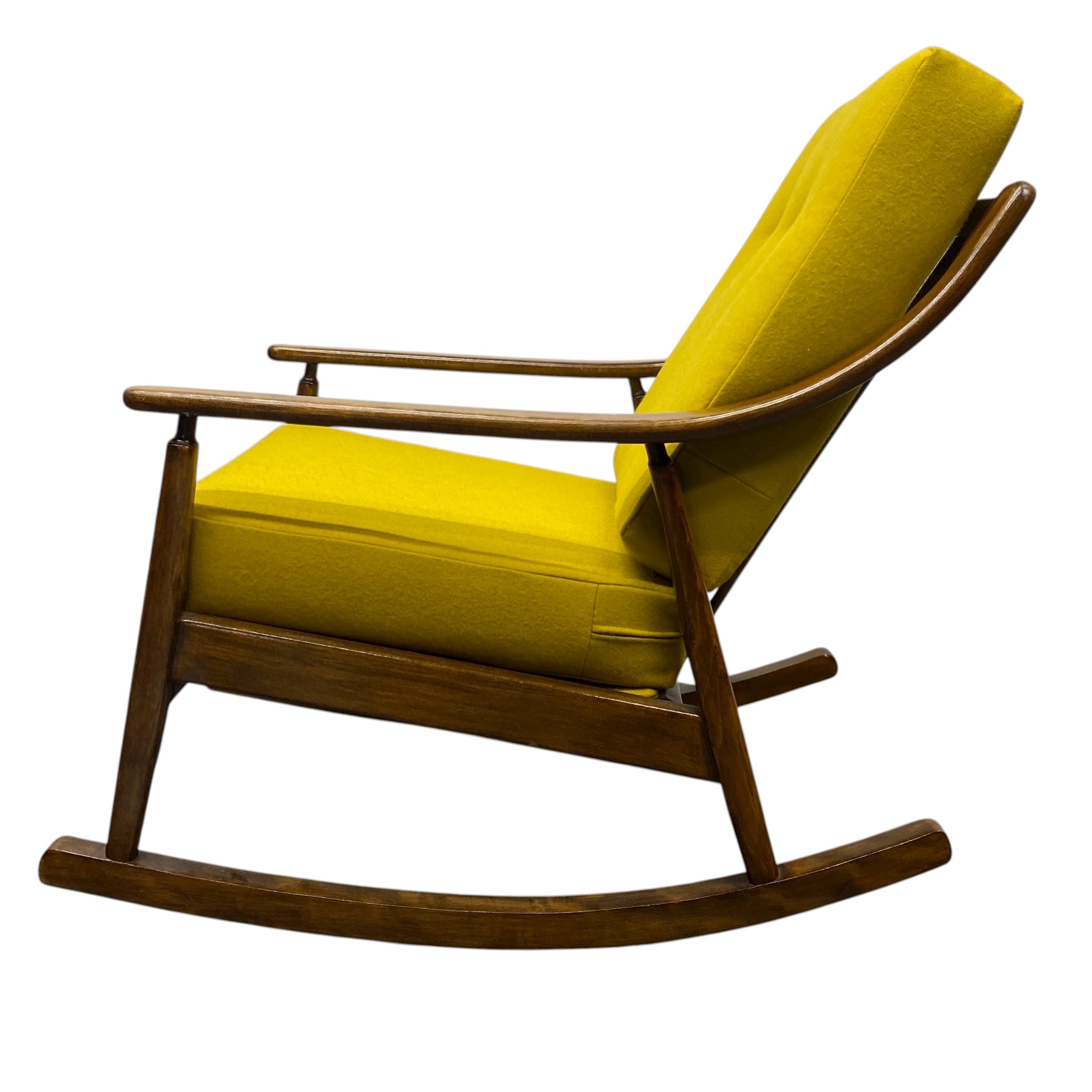 Rocking chair with yellow cushions on a white background