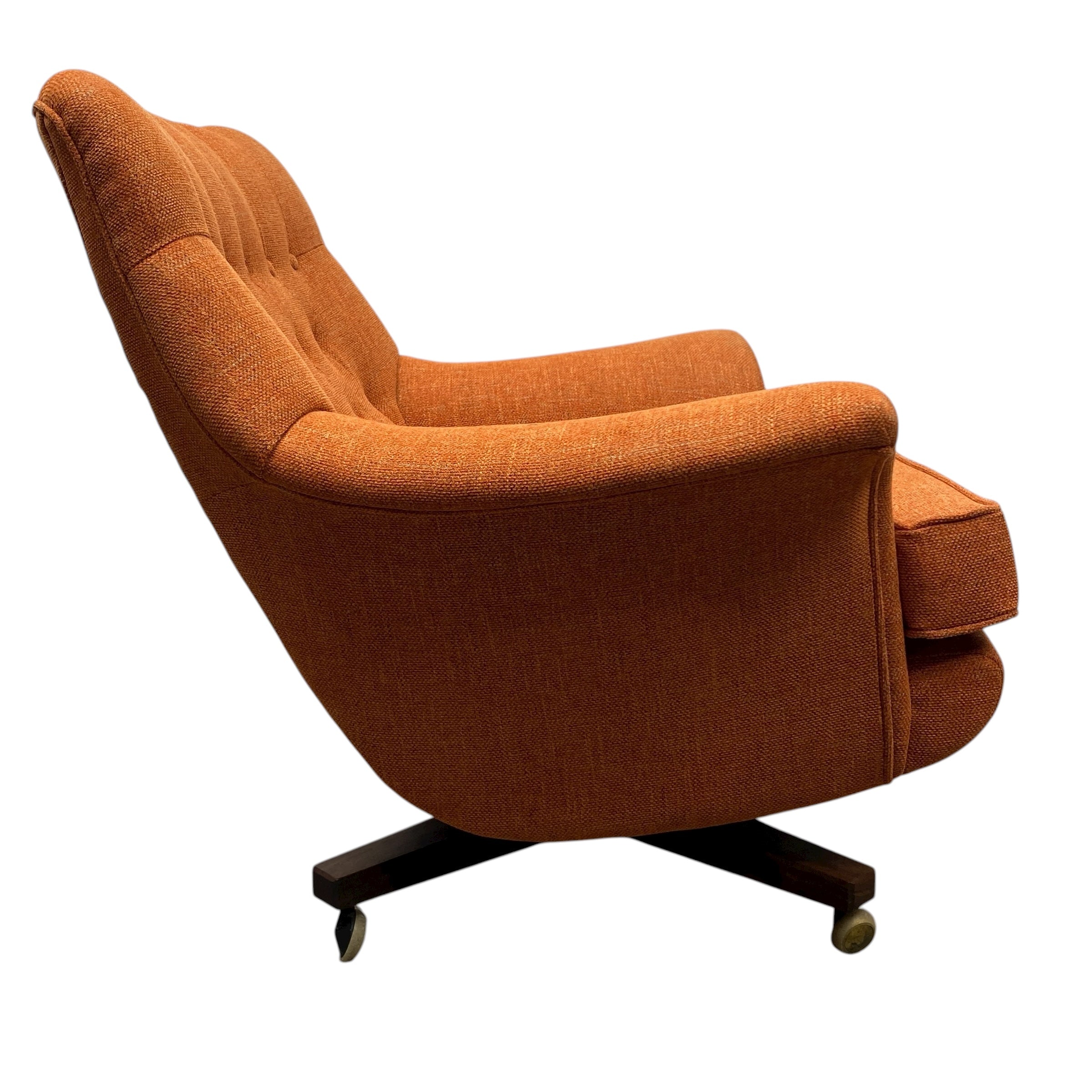 Orange armchair with a white background