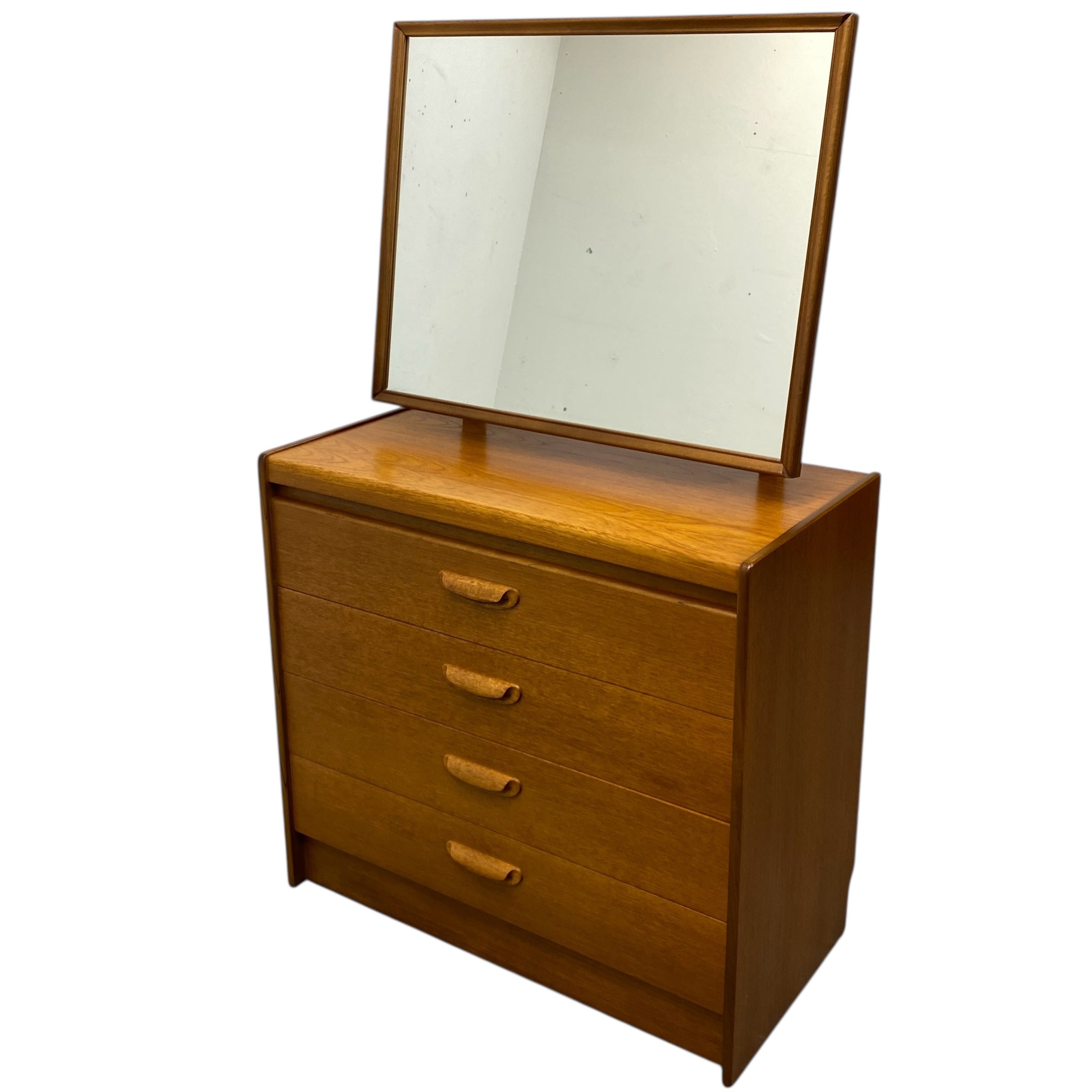 Wooden dresser with mirror on a white background