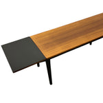 Load image into Gallery viewer, Long wooden table with black end on a white background
