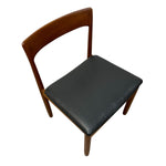 Load image into Gallery viewer, Wooden chair with a black leather seat on a white background
