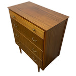 Load image into Gallery viewer, Wooden dresser with four drawers on a white background
