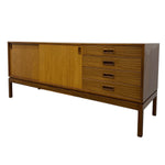 Load image into Gallery viewer, Wooden sideboard with doors and drawers on a white background
