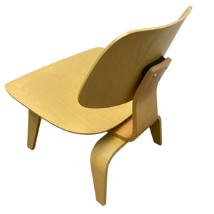 Wooden chair with a unique design on a white background