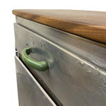 Load image into Gallery viewer, Metal drawer with wooden top and green handle on a white background
