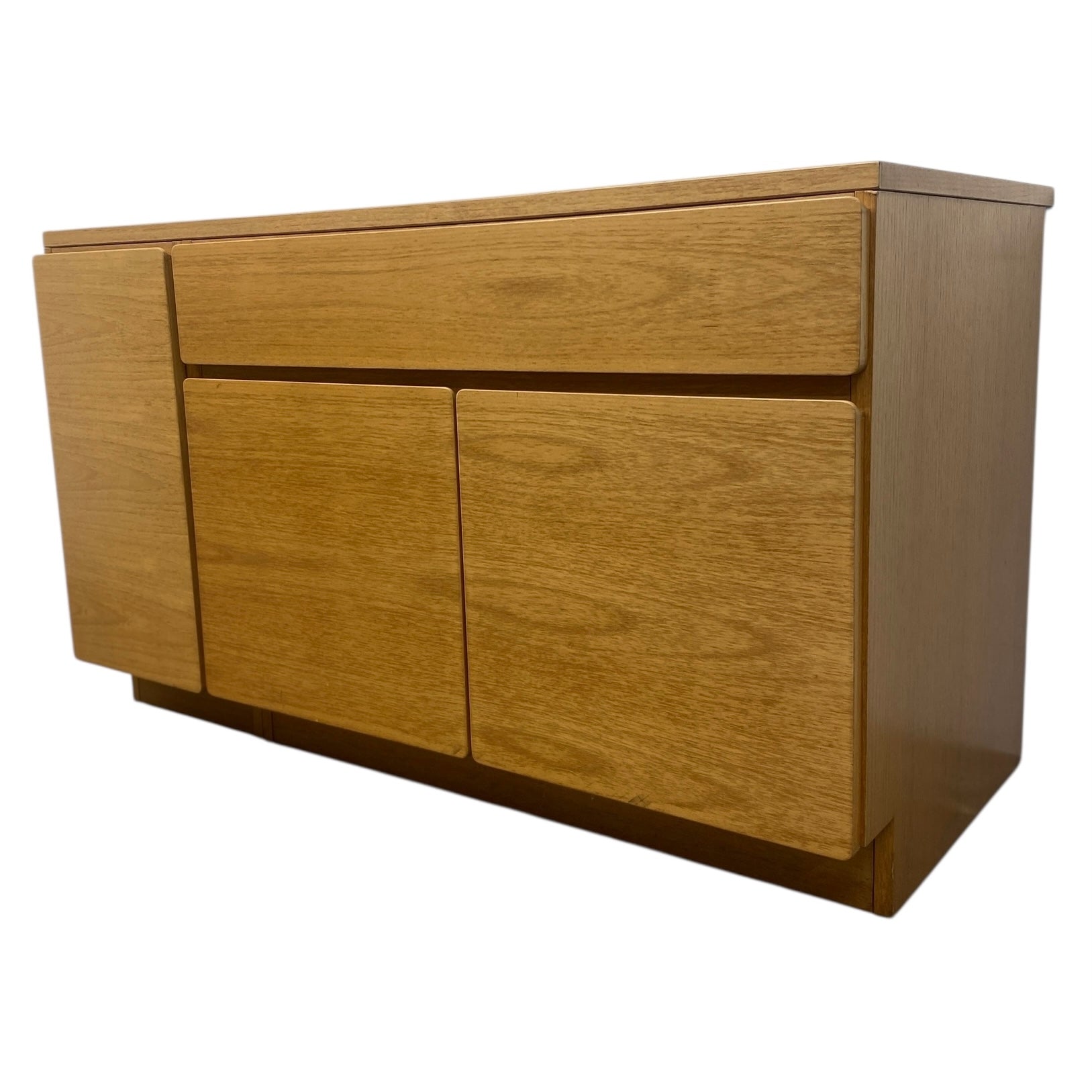 Wooden sideboard with two doors and a drawer on a white background