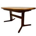 Load image into Gallery viewer, Wooden dining table with a white background
