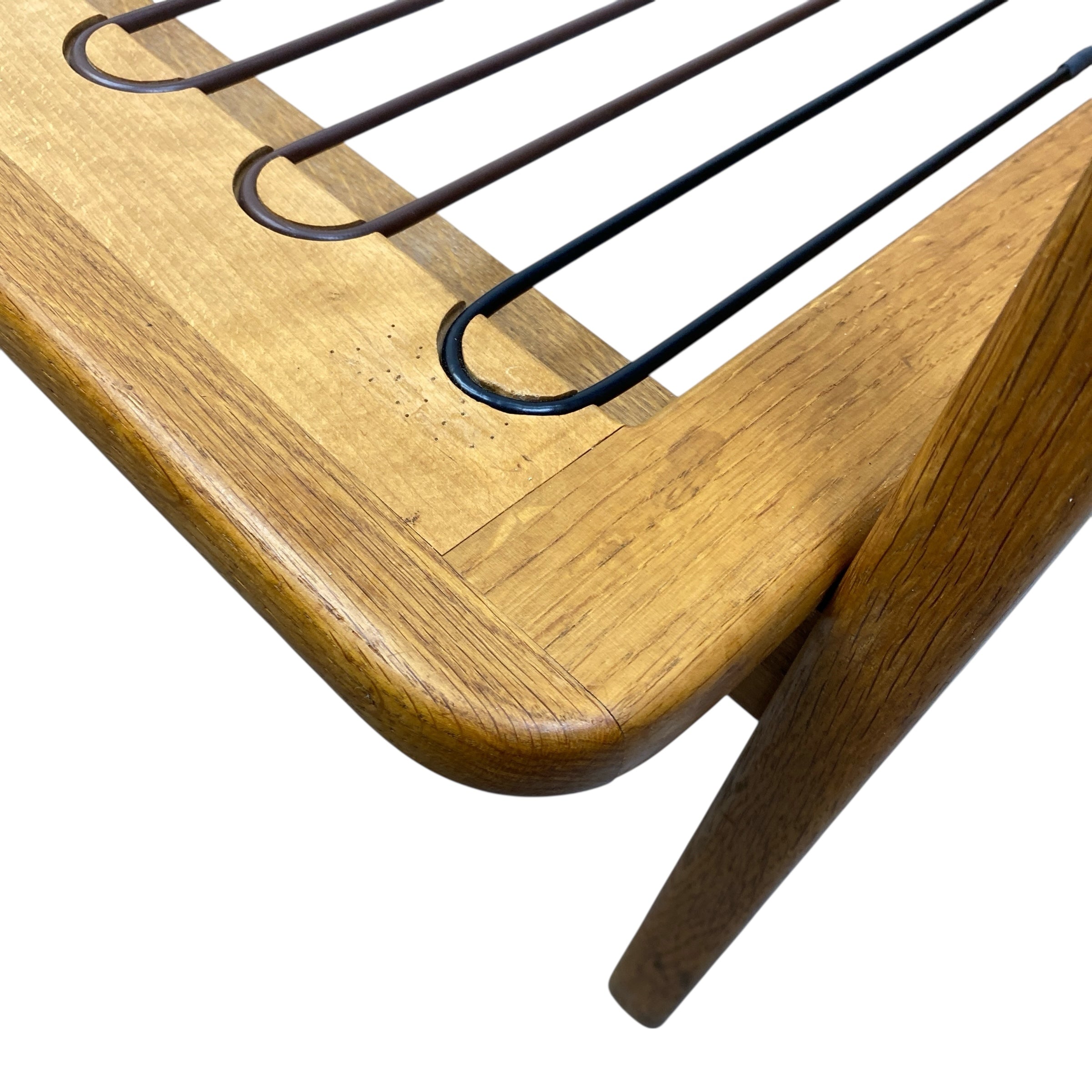 Wooden sofa with wire webbing