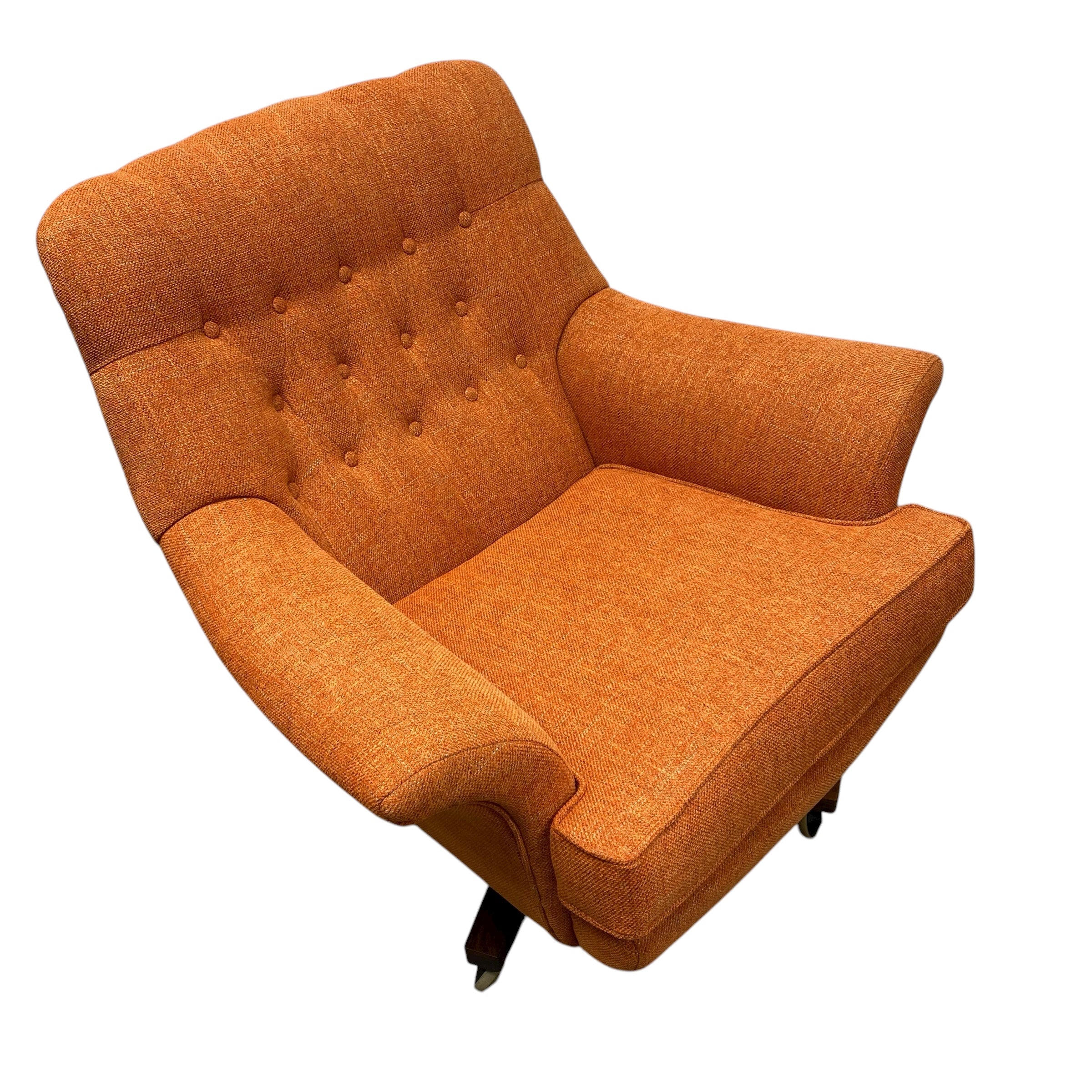 Orange armchair on a white background
