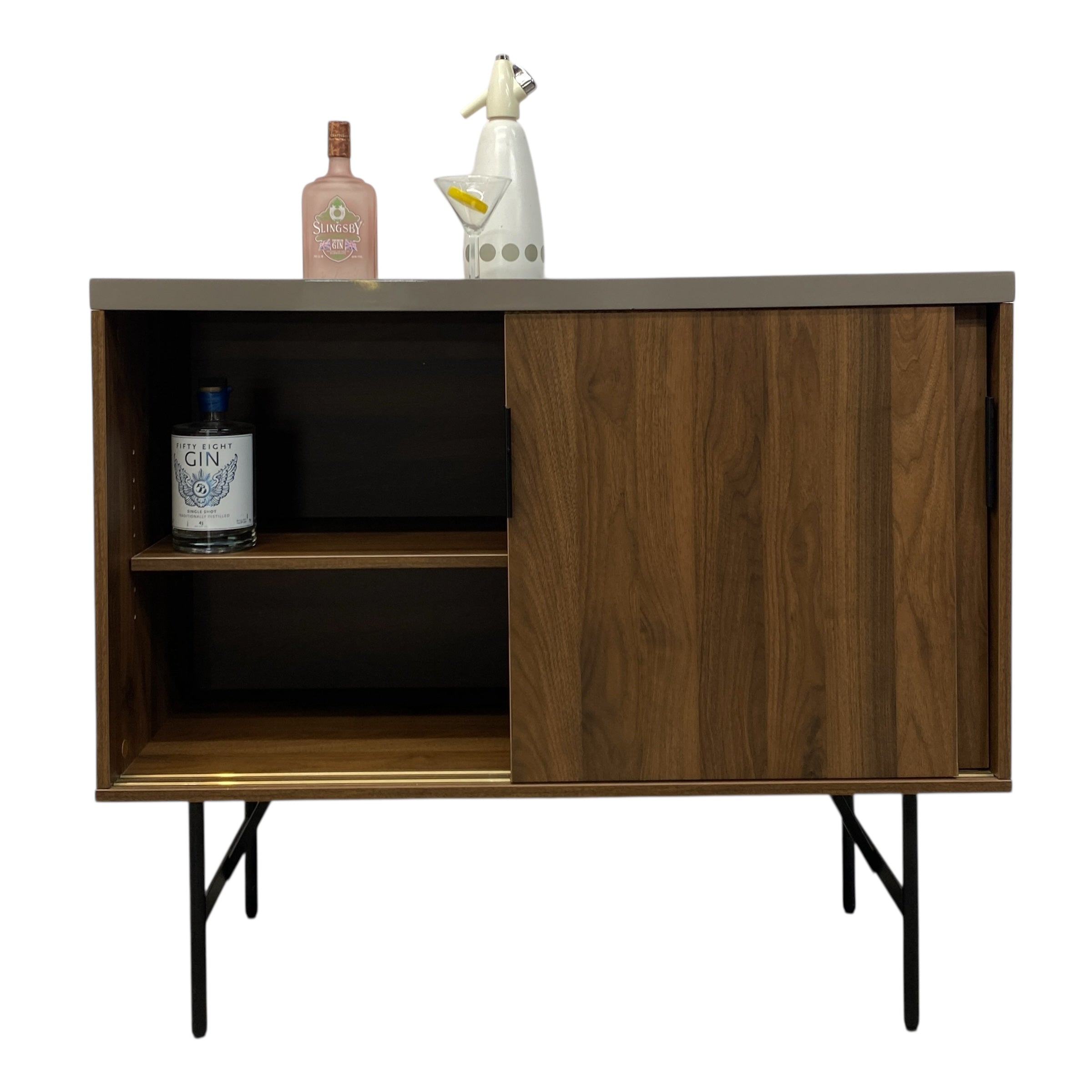 Wooden cabinet with a bottle and decorative item on a white background