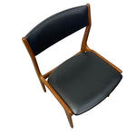 Load image into Gallery viewer, Chair with black leather seat and backrest on a white background
