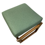 Load image into Gallery viewer, Green cushioned stool with wooden legs on a white background
