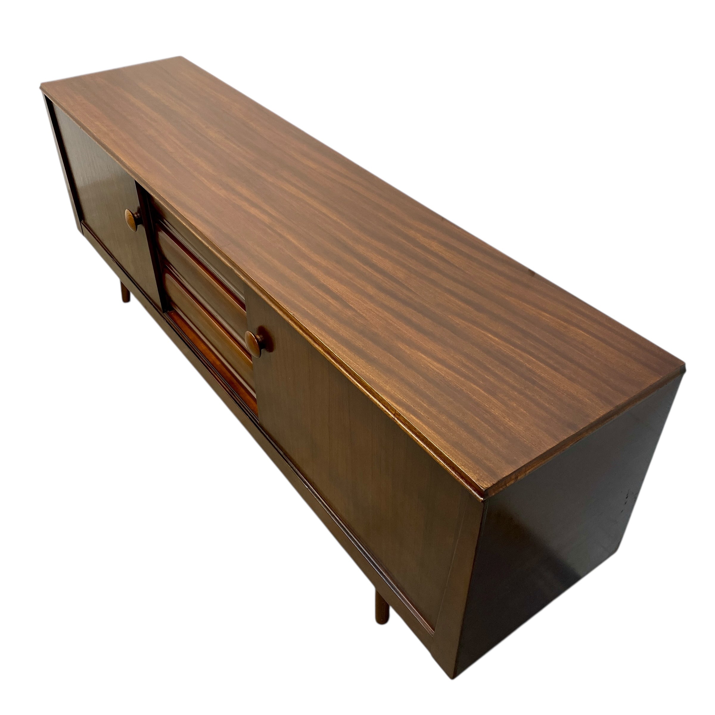 Wooden console table with drawers on a white background
