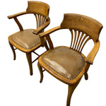 Load image into Gallery viewer, Two wooden chairs with leather seats on a white background
