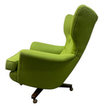 Load image into Gallery viewer, Green wingback chair on a white background
