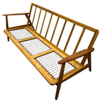 Load image into Gallery viewer, Wooden sofa with wire springs on a white background
