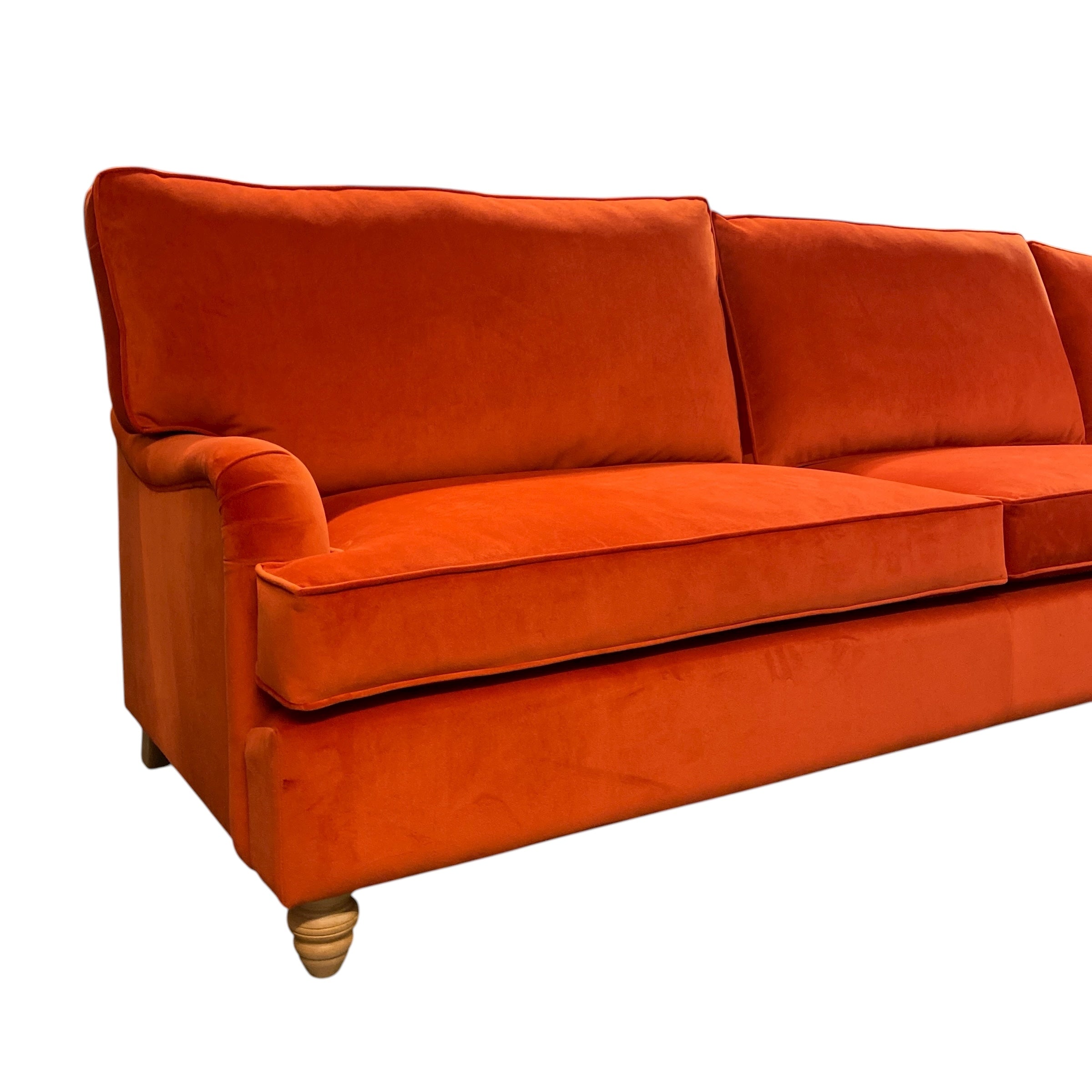 Orange sofa on a white background