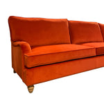 Load image into Gallery viewer, Orange sofa on a white background
